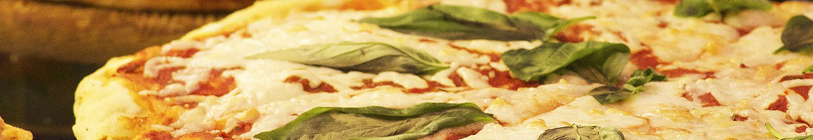 Eating Italian Pizza at Da Gianni restaurant in Oakland Park, FL.